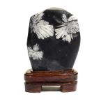 Minerals: A Chrysanthemum stone on wooden base 35cm.; 14ins overall