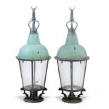 Lighting: A pair of bronze, iron and ceramic lanterns early 20th century 140cm.; 55ins high