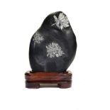 Minerals: A Chrysanthemum stone on wooden base 41cm.; 16ins overall