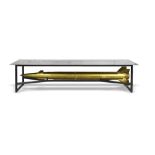 Toys for Boys: A glass topped table the frame supporting a gold painted SAN-4 missile 341cm.; 10