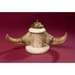 Natural History: An inkstand made from Warthog tusks with ivory and brass mounts circa 1900 28cm.;