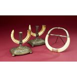 Natural History: A pair of silver plated candlestick holders by Rodgers with Wild Boar tusks circa