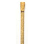 Walking sticks: A Victorian whalebone and marine ivory cane 19th century 86cm.; 34ins long