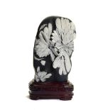 Minerals: A Chrysanthemum stone on wooden base China 48cm.; 19ins overall