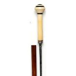 Walking sticks: A Malacca sword cane with ivory and tortoiseshell handle 19th century 86cm; 34ins