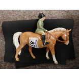 Beswick horse and rider (d/d) damage to riders leg and very small chip to ear. ..