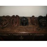 5 carved wooden masks