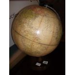 Globe on wooden stand