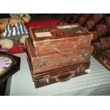 3 leather suitcases