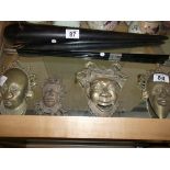 4 African style brass masks