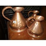3 copper measuring jugs
