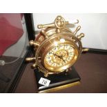 Late Vict brass clock in shape of ships wheel (working condition )
