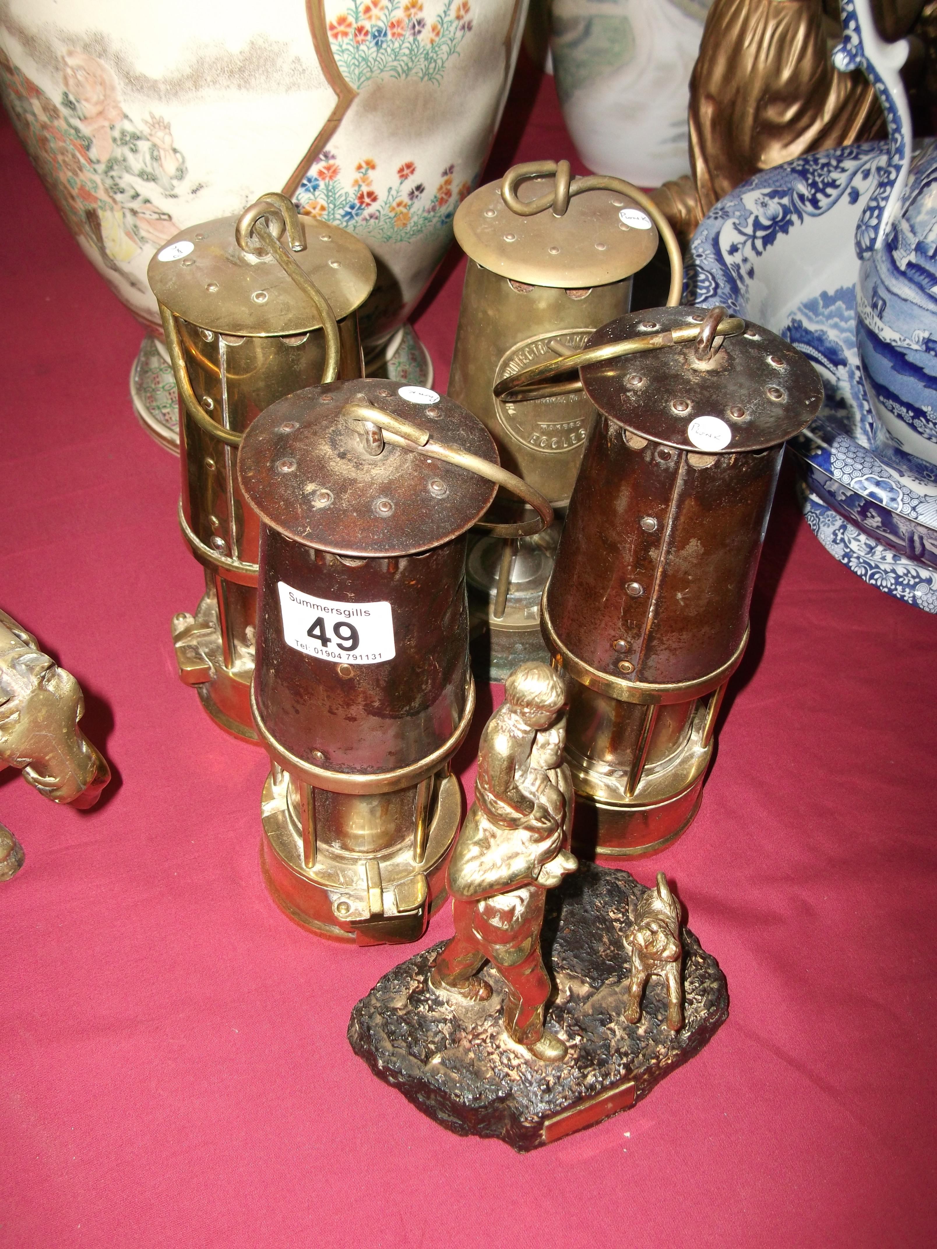 4 miners lamps + brass figure