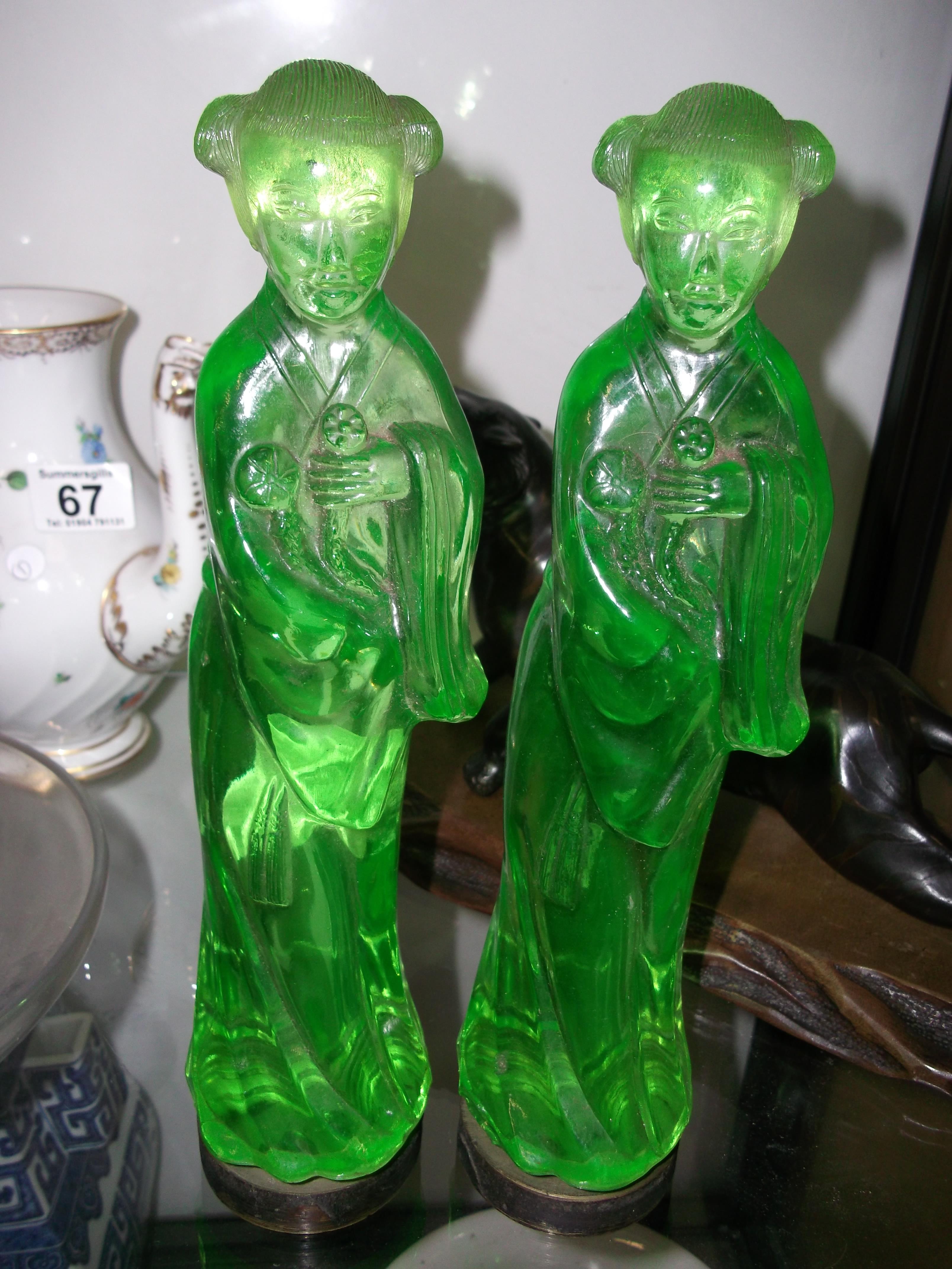 A pair of green glass oriental figures 28cm ( minor chips to figures )