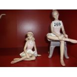 2 ballerina figures