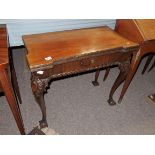 Antique mahogany games table