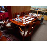 Walnut extending dining table and 6 chairs