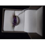 Amethyst and gold ladies ring
