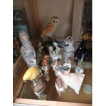 Collection of bird figures etc