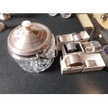 Silver biscuit barrel and napkin rings