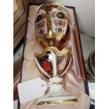 A Crown Derby egg and egg holder in excellent condition and marked LIV