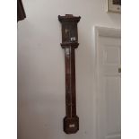 Antique mahogany stick barometer