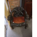 Oriental carved armchair
