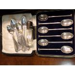 Silver spoons and scent bottle