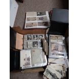 A large collection of Postcards and cig. cards