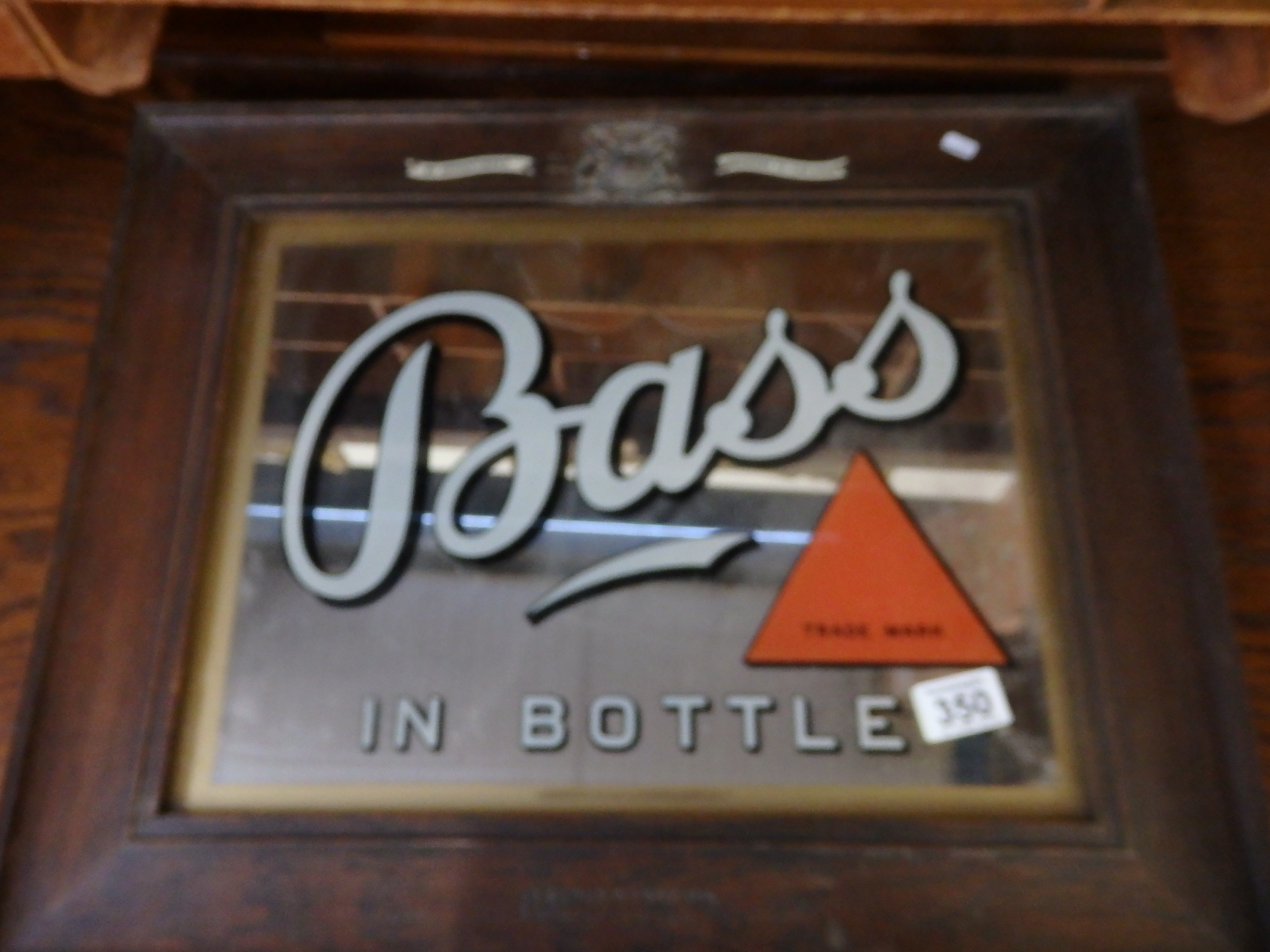 "Bass" mirror sign Appointed to the King