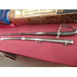 A dress sword and scabbard marked proof and leaf decoration 39" long ex. condition