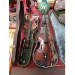 2 Violins in cases with bows and 1 marked medio - fino