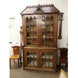 Antique oak bookcase in the style of a dolls house
