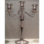 A LARGE REGENCY STYLE HALLMARKED SILVER CANDELABRA  Having three sconces on reeded and fluted