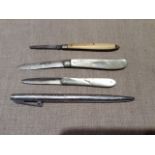 TWO SILVER AND MOTHER OF PEARL PENKNIVES  One engraved with floral decoration, together with a