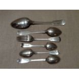 A COLLECTION OF GEORGIAN HALLMARKED SILVER SPOONS Including a serving spoon, dessert spoon and three