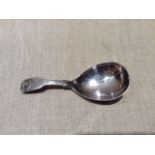 A GEORGIAN HALLMARKED SILVER CADDY SPOON Having a pear shaped bowl and shell design finial,