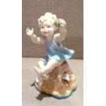 ROYAL WORCESTER, A LATE 20TH CENTURY PORCELAIN 'SABBATH' FIGURE Modelled as a young child, seated on