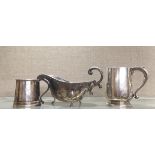 TWO ENGLISH HALLMARKED SILVER TANKARDS Along with a gravy boat.