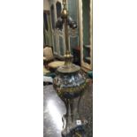 AN EDWARDIAN GREEN MARBLE AND GILT BRONZE TABLE LAMP Figured with Bacchus heads and hoof feet, of