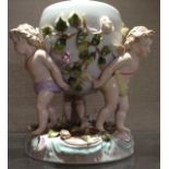 SITZENDORF, A 20TH CENTURY LARGE FIGURAL CENTREPIECE  Having three winged cherubs, holding aloft