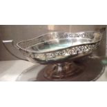 AN EARLY 20TH CENTURY CONTINENTAL SILVER TWO HANDLED CENTREPIECE BOWL Of oval form, having a pierced