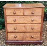 A VICTORIAN BLEECH MAHOGANY CHEST Of two short above three long drawers, fitted with turned knob