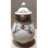 AN 18TH CENTURY CHINESE EXPORT FAMILLE ROSE PORCELAIN MILK JUG AND COVER Decorated in a pair of