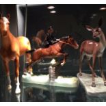 A LARGE BESWICK GROUP 'Show Jumper', along with a Beswick Palemino horse and a Portugese figure of a