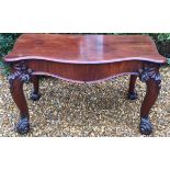 IN THE MANNER OF GILLOWS, A 19TH CENTURY MAHOGANY CONSOLE DINING TABLE Of serpentine form, with