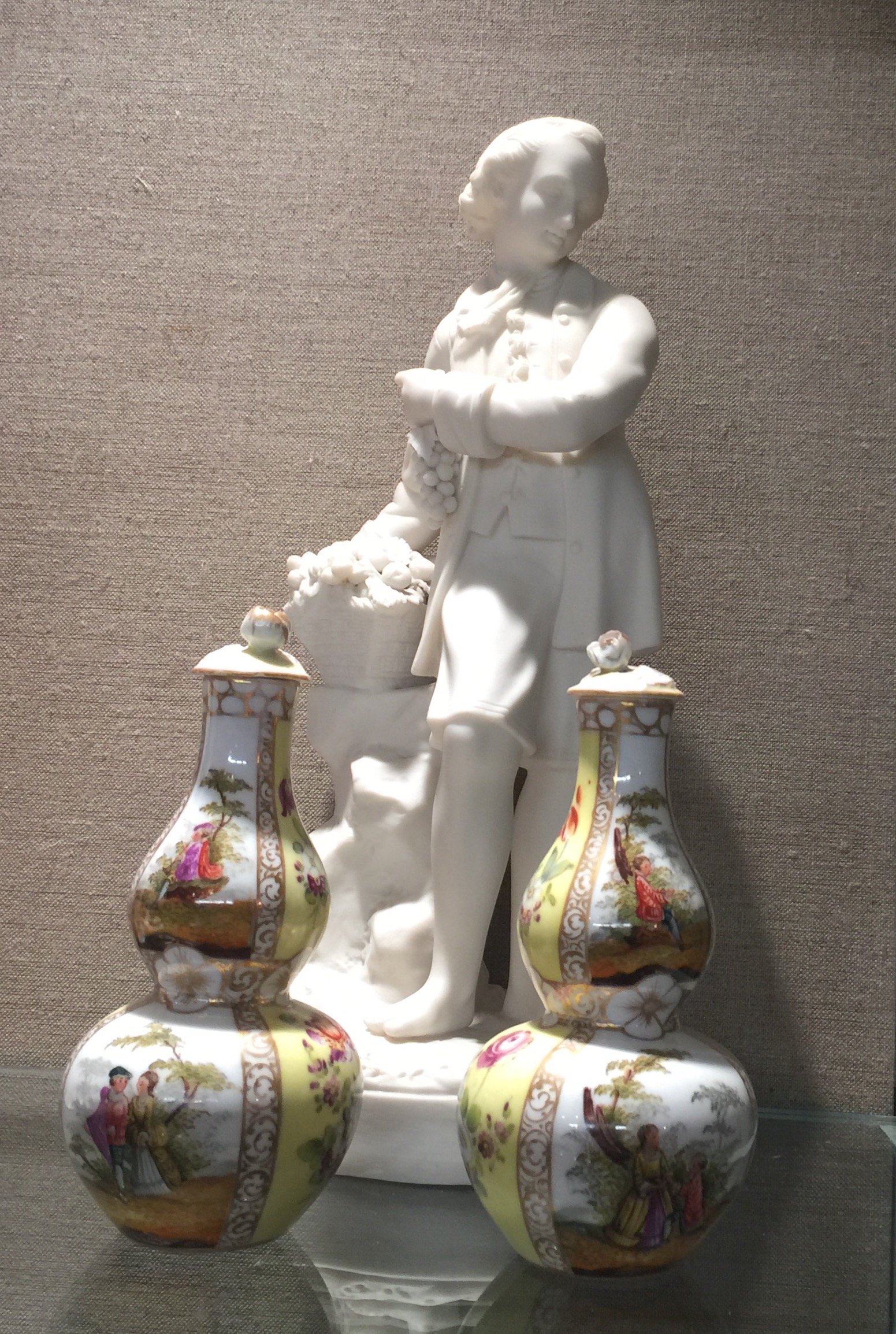 DRESDEN, A PAIR OF LATE 19TH CENTURY DOUBLE GOURD VASES AND COVERS Along with a Parian statue. (