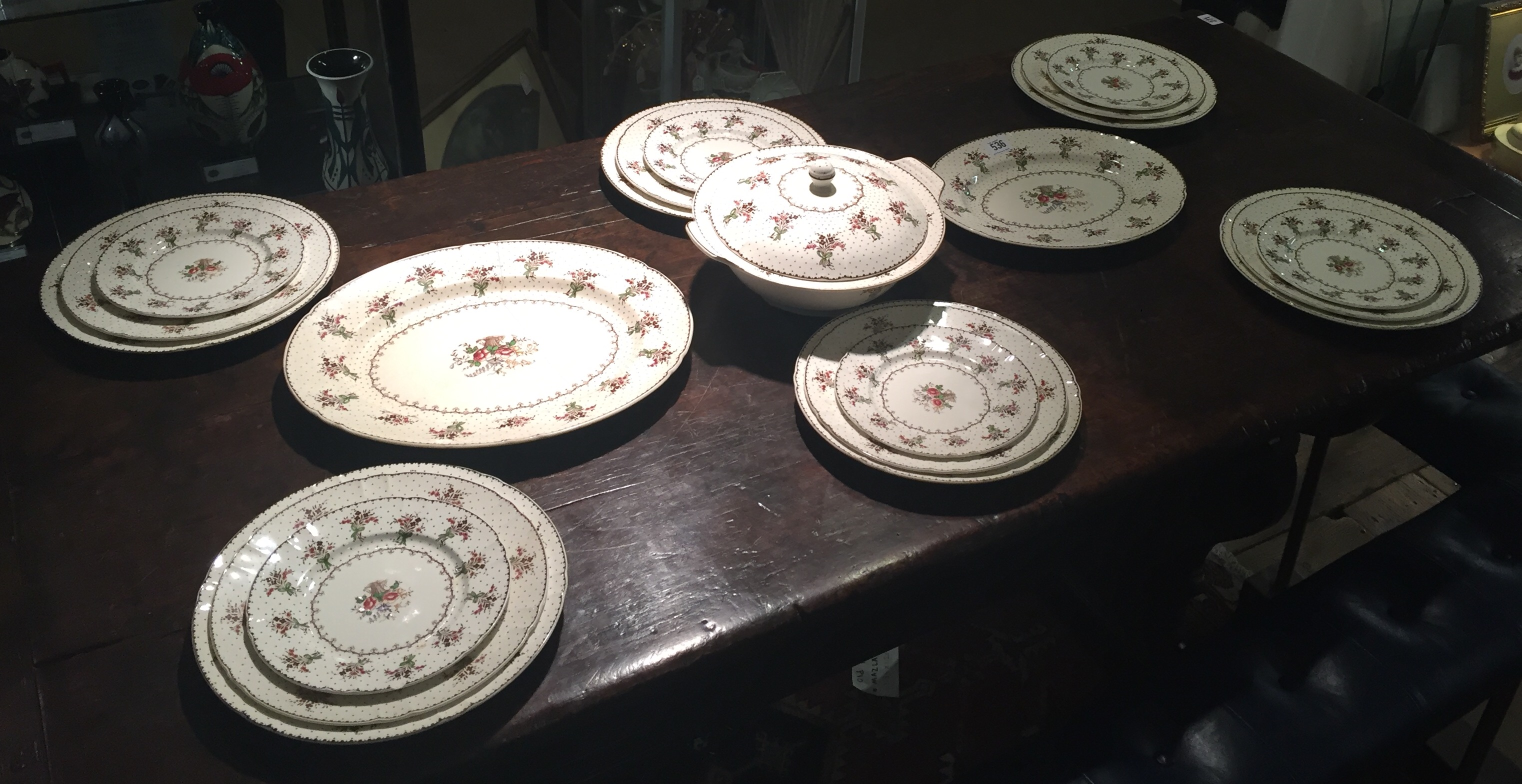 MINTONS, A LATE 19TH CENTURY PART DINNER SERVICE In Byron pattern, decorated with floral bouquets on