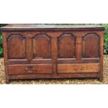 AN 18TH CENTURY OAK MULE CHEST With four ogee panels, above two drawers. (135cm x 49cm x 76cm)