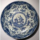 A LARGE CHINESE EXPORT BLUE AND WHITE CHARGER/DISH Hand painted with a central circular mondial,